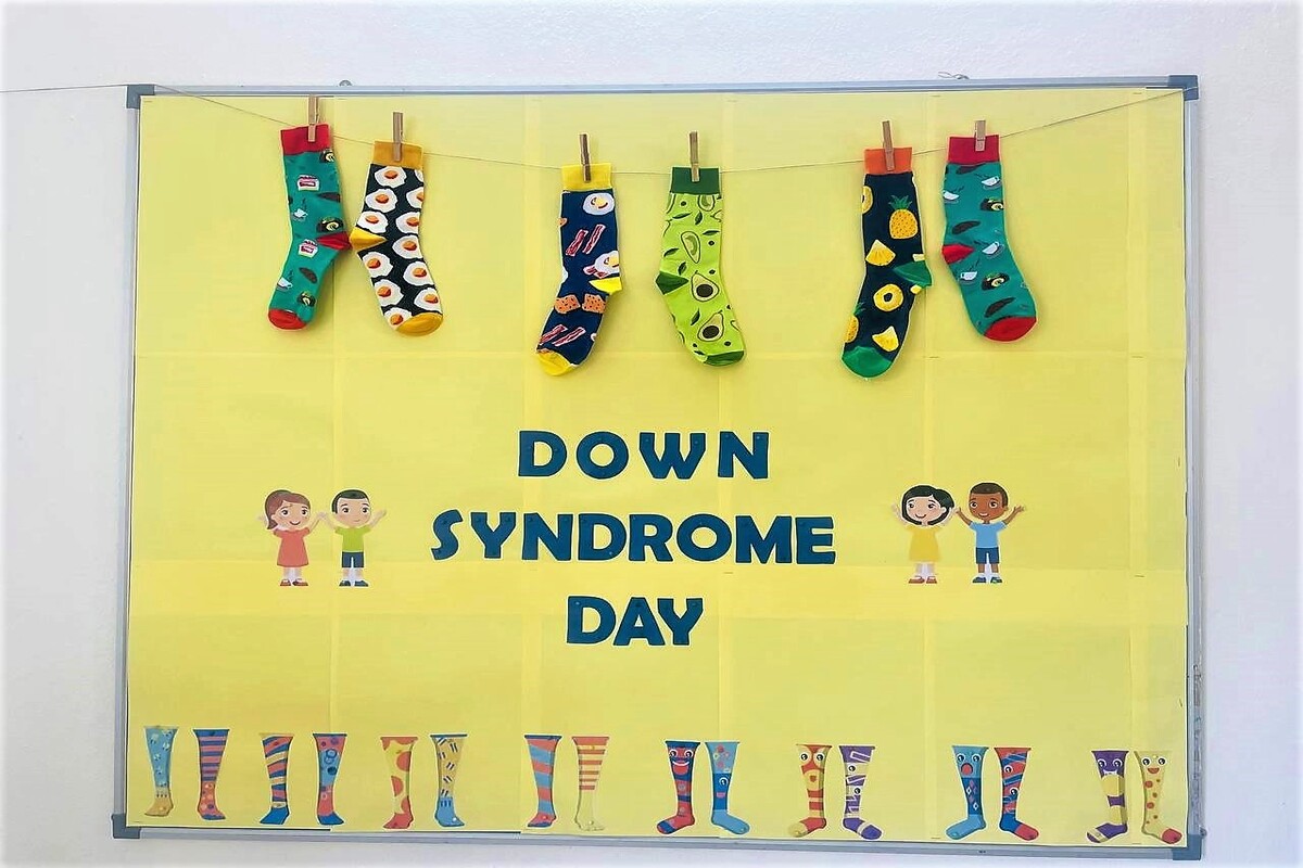 An illustration of Down Syndrome Day on a wall.