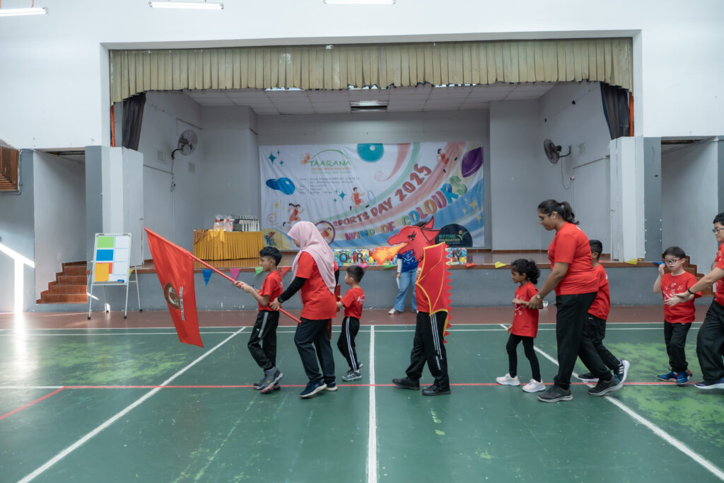 Students in the red group lining up for marching during Taarana Sports Day