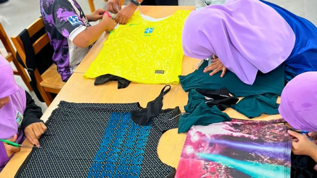 Kids cutting shirts